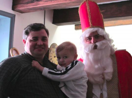 Theodore (Teddy) Kennedy and father Dan Kennedy visiting St. Nick - The Photo is by Teddy’s big brother William, our official Old Stone House Photographer for the event .